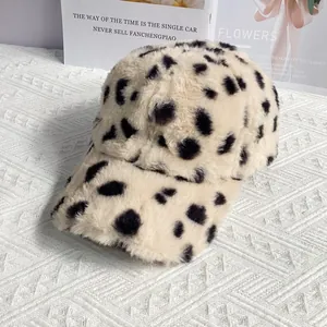 Detail of soft leopard print plush baseball cap with fluffy texture and curved brim