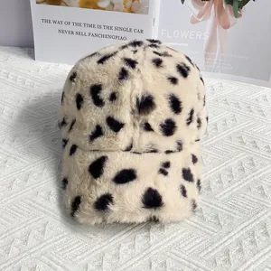 Detailed view of the soft faux fur texture and milk cow pattern on this baseball cap