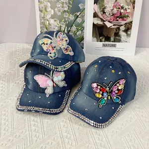 Denim baseball cap with rhinestone crown and handmade butterfly embellishments for women