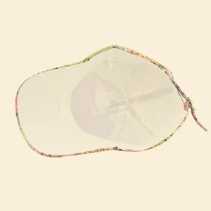 Detail view of cotton baseball cap inner lining with 100% cotton label and quality stitching