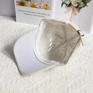 Detail view of corduroy baseball cap interior with adjustable buckle and metal strap
