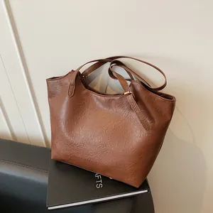 Brown vintage faux leather tote bag with large capacity and double strap for women