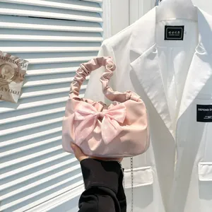 Pink pleated cloud handbag with ribbon bow and metal chain strap for women