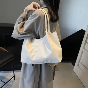 Minimalist large-capacity pleated tote bag in cream PU leather for daily commuting