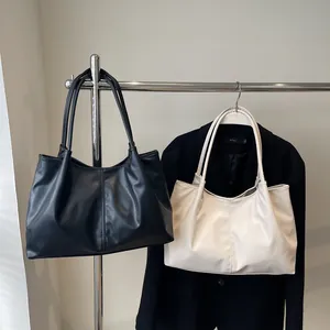 Minimalist large pleated tote bag set in black and creamy white matte faux leather