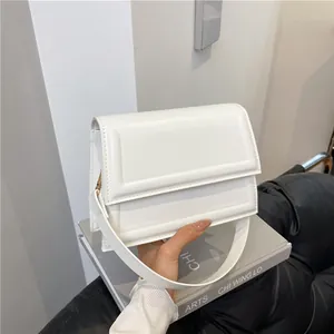 Elegant white square handbag for women with textured leather and gold metal buckle