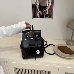 Minimalist black PU leather backpack with cute white cartoon cat and paw design