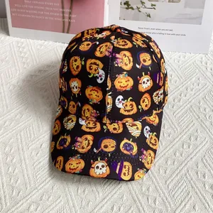 Detailed pattern of Halloween ghosts, pumpkins and wizard hats on a black cotton baseball cap