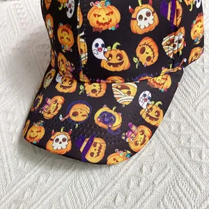 Detail of Halloween baseball cap with ghost, pumpkin and bat patterns on black cotton