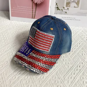 Detailed close-up of denim baseball cap featuring American flag pattern in sparkling rhinestones