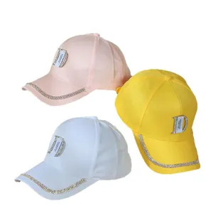 Luxe baseball cap with rhinestone brim, metal D-buckle, and satin finish in three colors