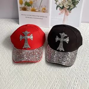 Fashionable baseball caps in black and red with sparkling rhinestone cross design