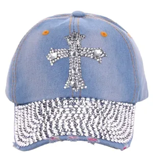 Denim baseball cap with rhinestone cross and studded brim in light blue washed finish