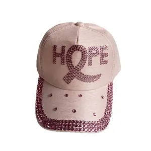 Pink baseball cap with rhinestone HOPE lettering and breast cancer ribbon embroidery