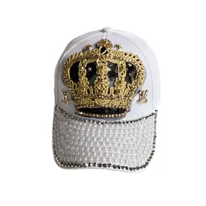 White baseball cap with gold crown embroidery, pearls and rhinestones decoration