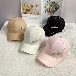 Close-up of lightweight rhinestone leaf baseball caps in khaki, white, pink and black