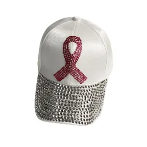 White satin baseball cap with pink rhinestone ribbon and sparkling diamond brim