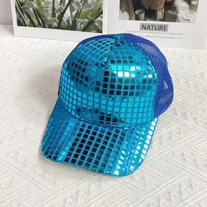 Detail of bright blue baseball cap featuring reflective square sequins and mesh back panel