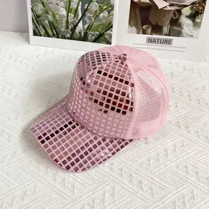 Detailed view of pink baseball cap with mirror sequins and breathable mesh back