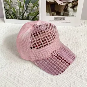 Close-up of pink sequin baseball cap showing reflective grid and breathable mesh detail