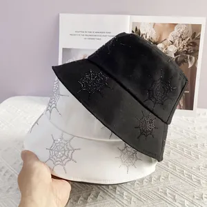 Fashionable cotton bucket hat featuring a sparkling rhinestone spider web pattern design