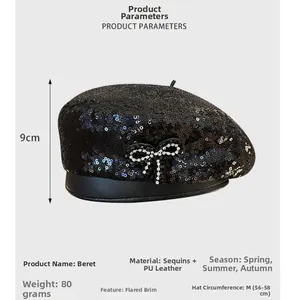 Vue détaillée du béret à paillettes noires avec nœud en strass et mesures du bord PU