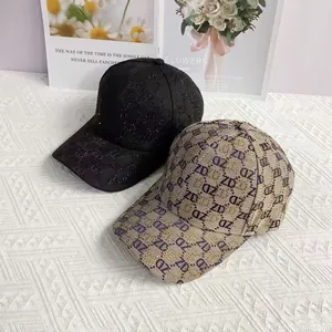 Fashionable ZD baseball caps with sequined and jacquard letters on textured background