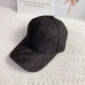 Detail of fashion black baseball cap with sparkling ZD rhinestone letters on crown