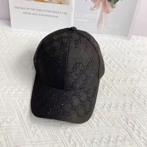 Detail of black baseball cap featuring ZD letter jacquard pattern and shiny rhinestones