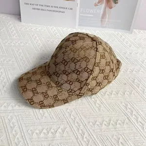Close-up of brown baseball cap featuring rhinestone-embellished ZD jacquard pattern