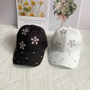 Floral rhinestone satin baseball caps in black and white with lace jacquard texture