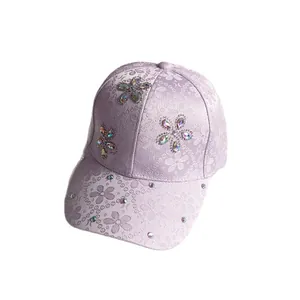 Lavender satin baseball cap with embossed floral texture and colorful crystal flower accents