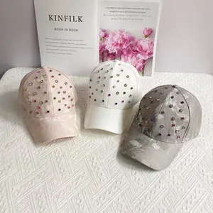 Chic baseball caps for women with colorful rhinestones in pink, white, and grey shades