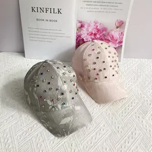 Luxe rhinestone-studded baseball cap in light gray and pink, stylish sun protection hat