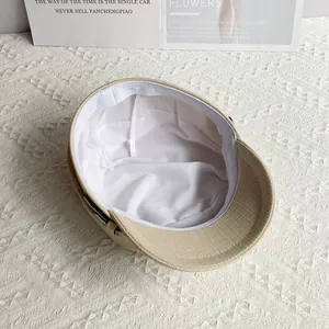Detailed inner view of the newsboy hat showing breathable lining and sweatband details