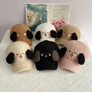 Flat lay of soft lamb wool cartoon dog baseball caps in various colors with embroidery