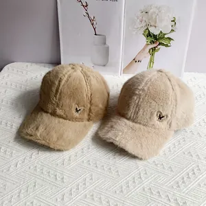 Winter faux rabbit fur baseball cap with rhinestone butterfly in camel and beige