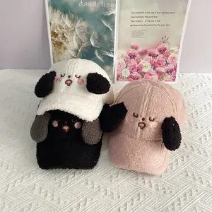 Close-up of soft sherpa baseball caps with cute embroidered puppy and fuzzy floppy ears