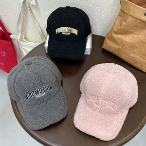 Winter plush baseball caps with PROMOTION embroidery in black, gray, and pink colors