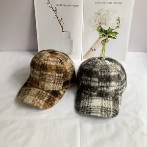 Two thick teddy fleece plaid baseball caps in brown and grey for autumn winter warmth