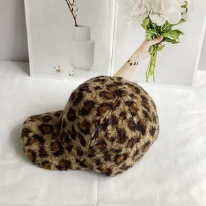 Detailed close-up of leopard print teddy fleece texture on this winter baseball cap