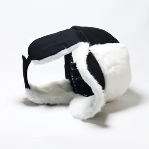 Detail showing plush faux fur lining and ear flaps of the winter trapper hat