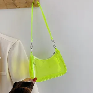 Detail of neon green transparent PVC shoulder bag with silver metal zipper and hook