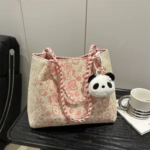 Knitted leopard print tote bag in pink and beige with cute panda plush charm accessory