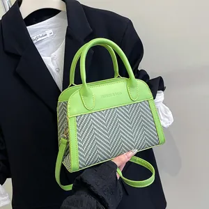 Contrast color leather and chevron fabric handbag with detachable shoulder strap