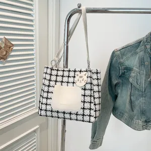 Chic houndstooth pattern tote bag with leather pocket and shoulder strap for women