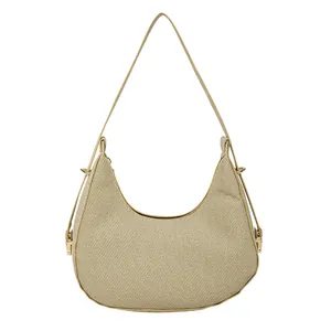 Minimalist beige woven half-moon shoulder bag with textured finish and long strap