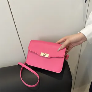 Hot pink minimalist rectangular flap shoulder bag with gold square metal lock hardware