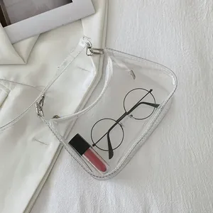 Close-up of clear PVC jelly bag with silver metal hooks and inner storage detail