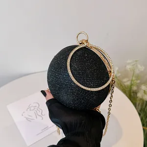 Sac de soirée sphérique à paillettes avec poignées dorées et bandoulière chaîne